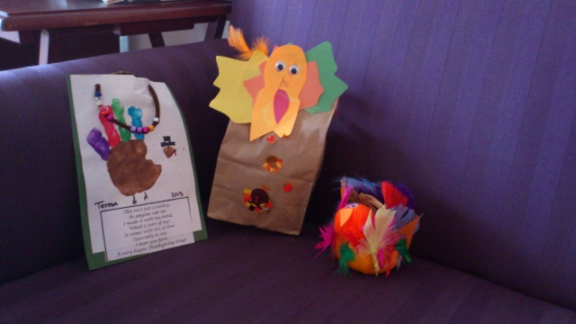 This isn't just a turkey, As anyone can see. I made it with my hand, Which is part of me! It comes with lots of love Specially to say - I hope you have A very happy Thanksgiving Day! (feitos pela Tetê, na escola)